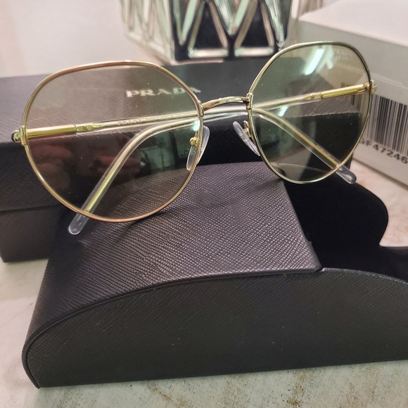 Prada Accessories - Prada sunglasses yellow lenses light yellow metal frames